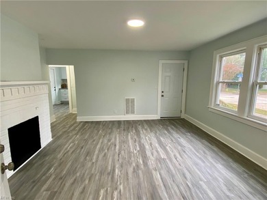 Attractive over under duplex on corner lot with detached garage on Oceanview Golf Course in Virginia - for sale on GolfHomes.com, golf home, golf lot