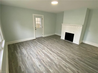 Attractive over under duplex on corner lot with detached garage on Oceanview Golf Course in Virginia - for sale on GolfHomes.com, golf home, golf lot