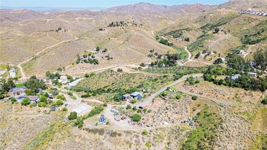Perched atop a scenic hillside in the highly desirable Temescal on Glen Ivy Golf Club in California - for sale on GolfHomes.com, golf home, golf lot