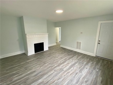 Attractive over under duplex on corner lot with detached garage on Oceanview Golf Course in Virginia - for sale on GolfHomes.com, golf home, golf lot