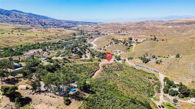 Perched atop a scenic hillside in the highly desirable Temescal on Glen Ivy Golf Club in California - for sale on GolfHomes.com, golf home, golf lot