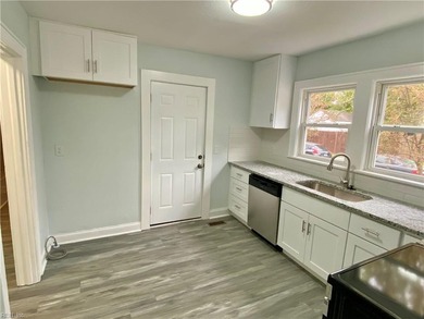 Attractive over under duplex on corner lot with detached garage on Oceanview Golf Course in Virginia - for sale on GolfHomes.com, golf home, golf lot