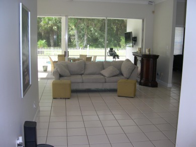 Great bargain price for this SF Pool home in Exclusive Meadowood on Meadowood Golf and Tennis Club in Florida - for sale on GolfHomes.com, golf home, golf lot