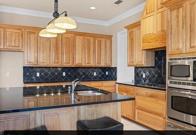 Welcome to this beautifully designed 2-bedroom, 2.5-bath on Harbor Lakes Golf Club in Texas - for sale on GolfHomes.com, golf home, golf lot