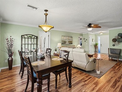 Under contract-accepting backup offers. Beautiful move-in ready on Caloosa Greens Executive Golf Course in Florida - for sale on GolfHomes.com, golf home, golf lot