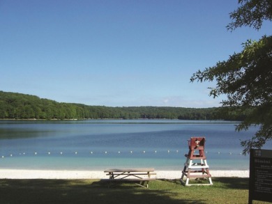 Ranch with a stunning lake view on Treasure Lake - Gold in Pennsylvania - for sale on GolfHomes.com, golf home, golf lot