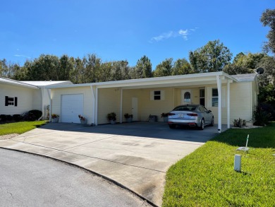 This home is located within a 55+ resort style leased land on Big Cypress Golf and Country Club in Florida - for sale on GolfHomes.com, golf home, golf lot