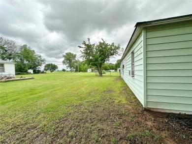 Discover this remodeled gem in Prague, featuring 2 bedrooms and on Prague Golf Course in Oklahoma - for sale on GolfHomes.com, golf home, golf lot