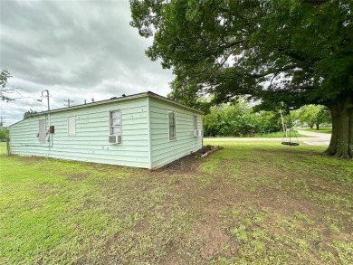 Discover this remodeled gem in Prague, featuring 2 bedrooms and on Prague Golf Course in Oklahoma - for sale on GolfHomes.com, golf home, golf lot