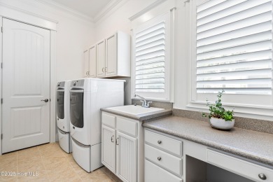 Welcome to 517 Moss Tree Drive - a charming and thoughtfully on Country Club of Landfall in North Carolina - for sale on GolfHomes.com, golf home, golf lot