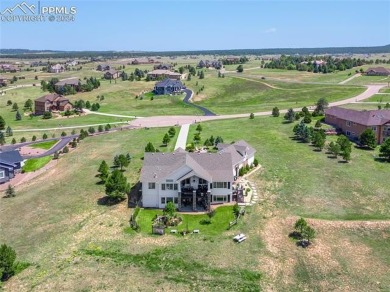 Country charm, city bliss in this extraordinary English Manor on Kings Deer Golf Club in Colorado - for sale on GolfHomes.com, golf home, golf lot