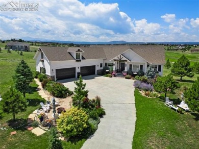 Country charm, city bliss in this extraordinary English Manor on Kings Deer Golf Club in Colorado - for sale on GolfHomes.com, golf home, golf lot