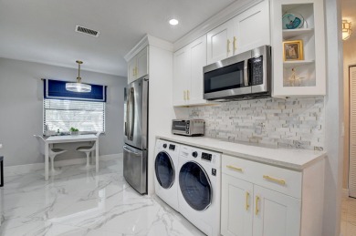 Welcome to Hunters Run Country Club! This spacious 2-bedroom on Hunters Run Golf and Country Club in Florida - for sale on GolfHomes.com, golf home, golf lot