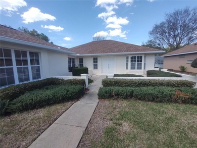 Charming Coventry model ready for new owners! This home features on Royal Oaks Golf Club in Florida - for sale on GolfHomes.com, golf home, golf lot