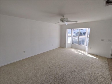 Charming Coventry model ready for new owners! This home features on Royal Oaks Golf Club in Florida - for sale on GolfHomes.com, golf home, golf lot