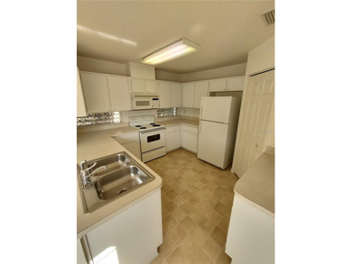 Charming Coventry model ready for new owners! This home features on Royal Oaks Golf Club in Florida - for sale on GolfHomes.com, golf home, golf lot