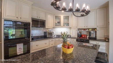 Located in the heart of Diamondhead, this spacious home sits on on Diamondhead Country Club in Mississippi - for sale on GolfHomes.com, golf home, golf lot