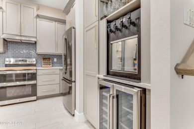 This exclusive four-bedroom townhome in the gated Plantation Bay on Plantation Bay Golf and Country Club in Florida - for sale on GolfHomes.com, golf home, golf lot