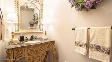 Located in the heart of Diamondhead, this spacious home sits on on Diamondhead Country Club in Mississippi - for sale on GolfHomes.com, golf home, golf lot