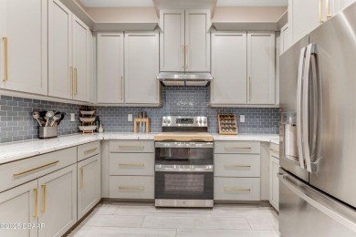 This exclusive four-bedroom townhome in the gated Plantation Bay on Plantation Bay Golf and Country Club in Florida - for sale on GolfHomes.com, golf home, golf lot