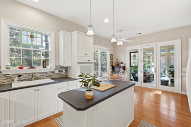 Discover the exceptional lifestyle at 627 Wild Dunes Circle on Porters Neck Country Club in North Carolina - for sale on GolfHomes.com, golf home, golf lot