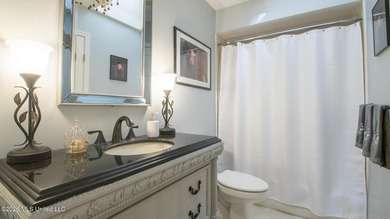 Located in the heart of Diamondhead, this spacious home sits on on Diamondhead Country Club in Mississippi - for sale on GolfHomes.com, golf home, golf lot