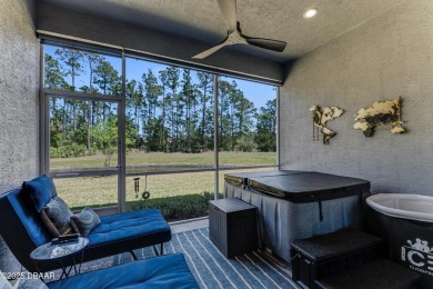 This exclusive four-bedroom townhome in the gated Plantation Bay on Plantation Bay Golf and Country Club in Florida - for sale on GolfHomes.com, golf home, golf lot