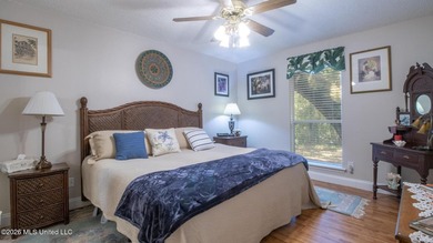 Located in the heart of Diamondhead, this spacious home sits on on Diamondhead Country Club in Mississippi - for sale on GolfHomes.com, golf home, golf lot