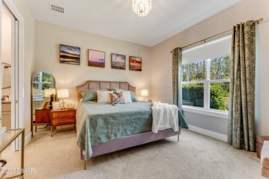 This exclusive four-bedroom townhome in the gated Plantation Bay on Plantation Bay Golf and Country Club in Florida - for sale on GolfHomes.com, golf home, golf lot