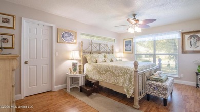 Located in the heart of Diamondhead, this spacious home sits on on Diamondhead Country Club in Mississippi - for sale on GolfHomes.com, golf home, golf lot