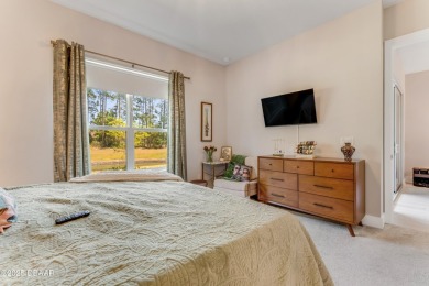This exclusive four-bedroom townhome in the gated Plantation Bay on Plantation Bay Golf and Country Club in Florida - for sale on GolfHomes.com, golf home, golf lot