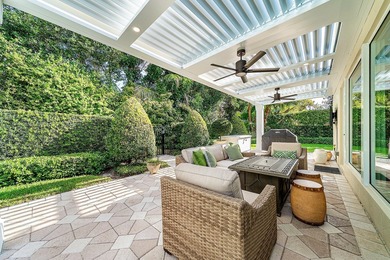 Experience refined living in this beautifully renovated on Pine Tree Golf Club in Florida - for sale on GolfHomes.com, golf home, golf lot