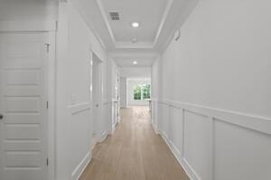 Discover Southern elegance in this exquisite Wescott Elevation A on Woodside Plantation Country Club in South Carolina - for sale on GolfHomes.com, golf home, golf lot