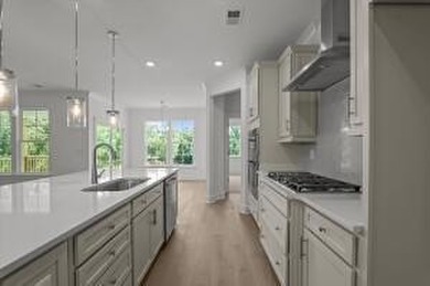 Discover Southern elegance in this exquisite Wescott Elevation A on Woodside Plantation Country Club in South Carolina - for sale on GolfHomes.com, golf home, golf lot