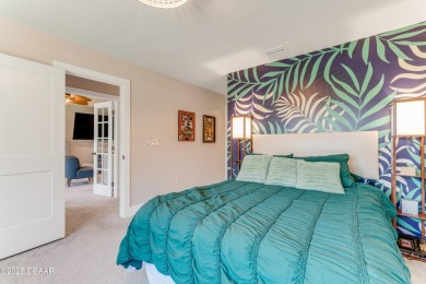This exclusive four-bedroom townhome in the gated Plantation Bay on Plantation Bay Golf and Country Club in Florida - for sale on GolfHomes.com, golf home, golf lot