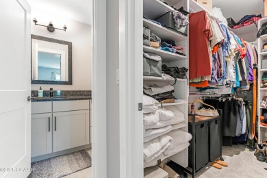 This exclusive four-bedroom townhome in the gated Plantation Bay on Plantation Bay Golf and Country Club in Florida - for sale on GolfHomes.com, golf home, golf lot