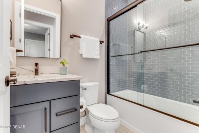 This exclusive four-bedroom townhome in the gated Plantation Bay on Plantation Bay Golf and Country Club in Florida - for sale on GolfHomes.com, golf home, golf lot
