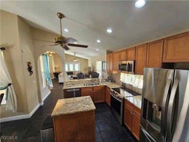 Exquisite Mediterranean Courtyard Estate with Guest House on Heritage Palms Golf and Country Club in Florida - for sale on GolfHomes.com, golf home, golf lot