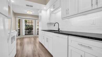 Enjoy FREE GOLF and MAINTENANCE-FREE LIVING in this Villa that on Highland Lakes Executive Golf Course in Florida - for sale on GolfHomes.com, golf home, golf lot