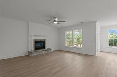 Discover Southern elegance in this exquisite Wescott Elevation A on Woodside Plantation Country Club in South Carolina - for sale on GolfHomes.com, golf home, golf lot