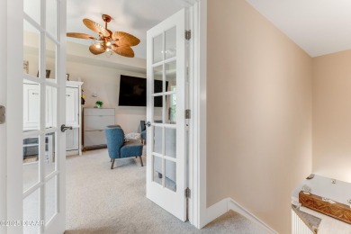 This exclusive four-bedroom townhome in the gated Plantation Bay on Plantation Bay Golf and Country Club in Florida - for sale on GolfHomes.com, golf home, golf lot
