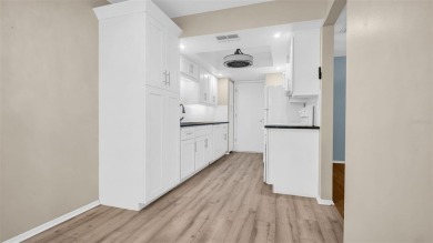 Enjoy FREE GOLF and MAINTENANCE-FREE LIVING in this Villa that on Highland Lakes Executive Golf Course in Florida - for sale on GolfHomes.com, golf home, golf lot
