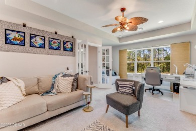 This exclusive four-bedroom townhome in the gated Plantation Bay on Plantation Bay Golf and Country Club in Florida - for sale on GolfHomes.com, golf home, golf lot