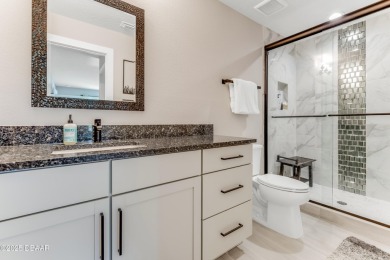 This exclusive four-bedroom townhome in the gated Plantation Bay on Plantation Bay Golf and Country Club in Florida - for sale on GolfHomes.com, golf home, golf lot