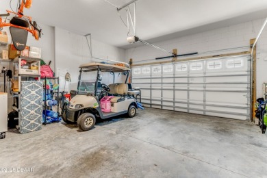 This exclusive four-bedroom townhome in the gated Plantation Bay on Plantation Bay Golf and Country Club in Florida - for sale on GolfHomes.com, golf home, golf lot
