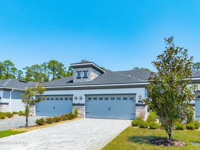 This exclusive four-bedroom townhome in the gated Plantation Bay on Plantation Bay Golf and Country Club in Florida - for sale on GolfHomes.com, golf home, golf lot
