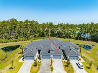 This exclusive four-bedroom townhome in the gated Plantation Bay on Plantation Bay Golf and Country Club in Florida - for sale on GolfHomes.com, golf home, golf lot