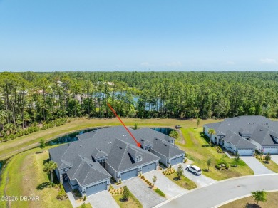 This exclusive four-bedroom townhome in the gated Plantation Bay on Plantation Bay Golf and Country Club in Florida - for sale on GolfHomes.com, golf home, golf lot