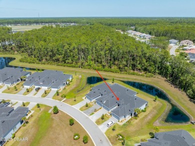 This exclusive four-bedroom townhome in the gated Plantation Bay on Plantation Bay Golf and Country Club in Florida - for sale on GolfHomes.com, golf home, golf lot