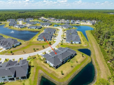 This exclusive four-bedroom townhome in the gated Plantation Bay on Plantation Bay Golf and Country Club in Florida - for sale on GolfHomes.com, golf home, golf lot